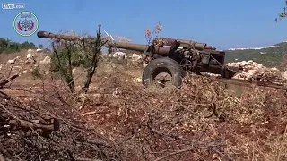 HOT NEW! Syrian rebels fire rounds from a 130mm field gun