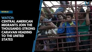Central American migrants join the thousands-strong caravan heading to the United States