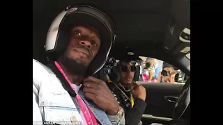 Usain Bolt gets a fright on a flying lap of the US Grand Prix track by Lewis Hamilton in a Mercedes