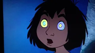 Kaa hypnotizes Mowgli