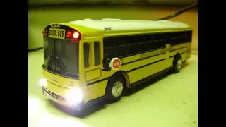 Custom North Carolina Public Schools Thomas Saf T Liner HDX diecast bus model with working lights