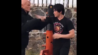 Sifu Nate demonstrates Wooden Dummy set 3 via wingchunkungfuclub