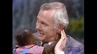 Johnny Carson hugging a baby Orangutan, 1978