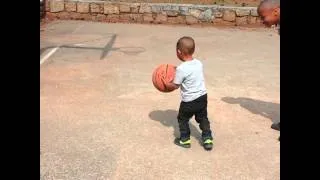 2 years old dribbling basketball