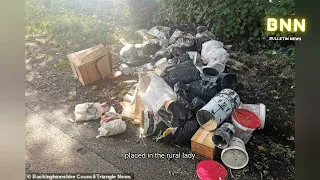 Moment brazen fly-tipper is caught red-handed dumping household waste in picturesque country layby