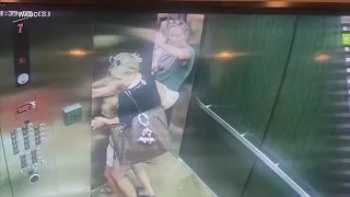 Girl's arm gets sucked into elevator door, gets stuck