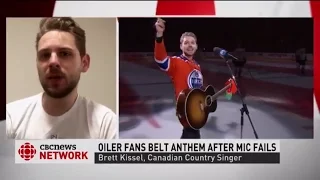 Oilers fans belt out U.S. anthem after mic fails