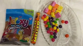 Unpacking Lollipops Skittels,Galaxy worms and Meller
