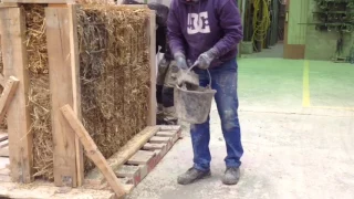 Mur en paille avec un crépis à la chaux