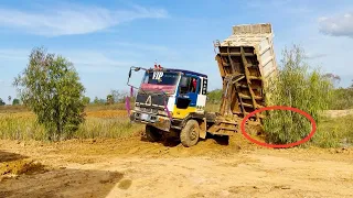 Incredible dump truck wheel 10 Transport Land fill up into the pond pushing by bulldozer komat'su