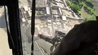 27/04/2018 Афганистан. работа минигана с борта вертолёта по кишлаку.