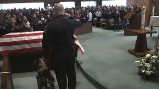 K9 Indi says goodbye to officer Flores