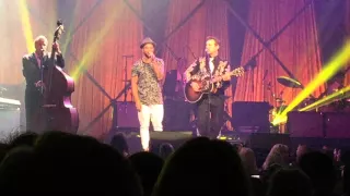 Can't Help Falling in Love sung by Chris Isaak and Guy Sebastian
