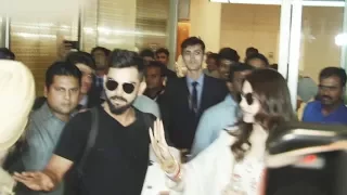 Virat Kohli Protects Wife Anushka Sharma From Media & FANS At Mumbai Airport