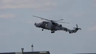 Royal Navy Wildcat flying over RNAS Yeovilton