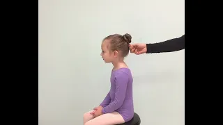 How to put a child's hair into a bun
