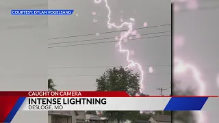 Microburst, lightning caught on camera Wednesday night