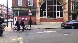 Boris and Jeremy Paxman take to the tandem - Newsnight