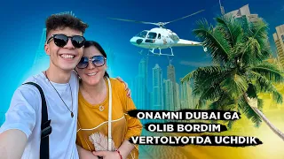 Onamni Dubai ga olib bordim . Vertolyotda uchdik