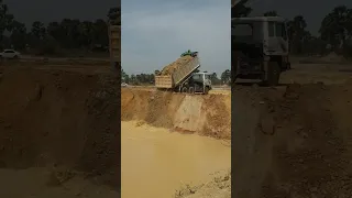 Best Dump Truck Unloading Dirt Into The Water Deep Pond Filling Up Process Skill Driver