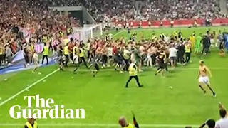 Nice v Marseille: fans invade pitch after clashes with players