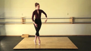 Pointe work with rosin on a wood dance floor