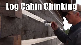 Chinking the log Cabin