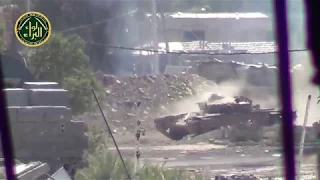 На камеру стреляет танк Т-72,  в Сирийском городе Дамаске. 18-12-2017