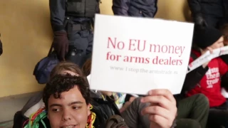 Peace activists stop arms lobby "No EU money for arms dealers"