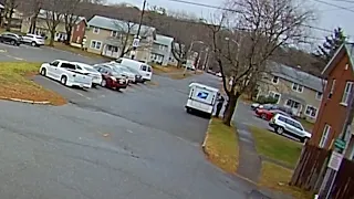 Video shows mail carrier being robbed at gunpoint in Peabody