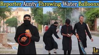 Reporter Burqa Aunty Throwing Water Balloons - Lahorianz