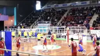 Russian youth volleyball team warming up before the game