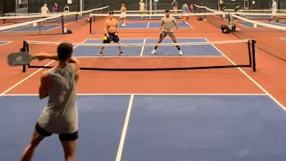 Men’s doubles Pickleball play. Smash fest Warm up game.  Franklyn x40 89 degrees out.