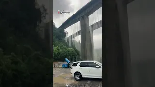 Bridge in China overflows with water after heavy rains #shorts