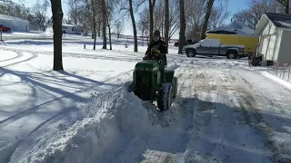 John Deere 617 Articulated Garden Tractor Plowing Snow