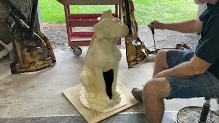 De-molding a 190 pound concrete Dog mold. Latex and fiberglass mold.