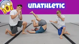 TEACHING OUR UNATHLETIC BROTHER A BACKFLIP!