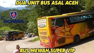 Dua Unit Bus Mewah Asal Aceh Nanjak Bareng Curi Perhatian di Sitinjau Lauik