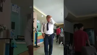 Security guard dances to Cupid by fifty fifty tik tok