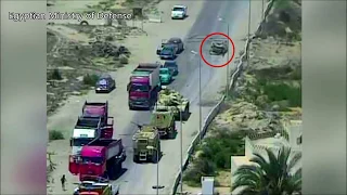 В Египте танк раздавил авто со взрывчаткой и смертниками , на контрольно-пропускном пункте .