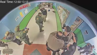 Newly released Uvalde shooting footage shows police response to tragedy from inside school