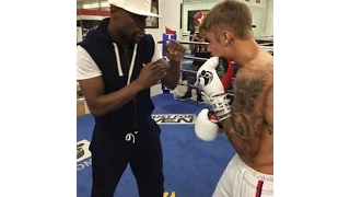 Justin Bieber boxing with Floyd Mayweather - 16 October, 2014