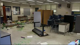 Teens charged with vandalizing school