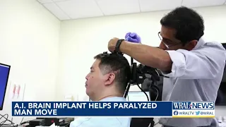 AI brain implant helps paralyzed man move