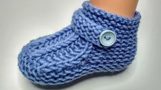 Simple booties with knitting needles. Children's socks on two knitting needles