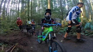 A serious group of mountain bike kids sessions huge jumps at Duthie Hill