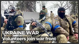 ‘We are going to defend ourselves’: Ukrainians join war front