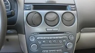 How to Remove Radio / CD Changer / Display / Clock from Mazda 6 2004 for Repair.