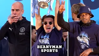 Manchester City team celebrate Premier League title win with fans