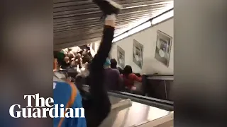 Escalator speeds up and collapses in Rome, injuring football fans